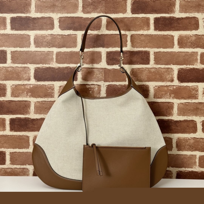 G*u*i top handle bags